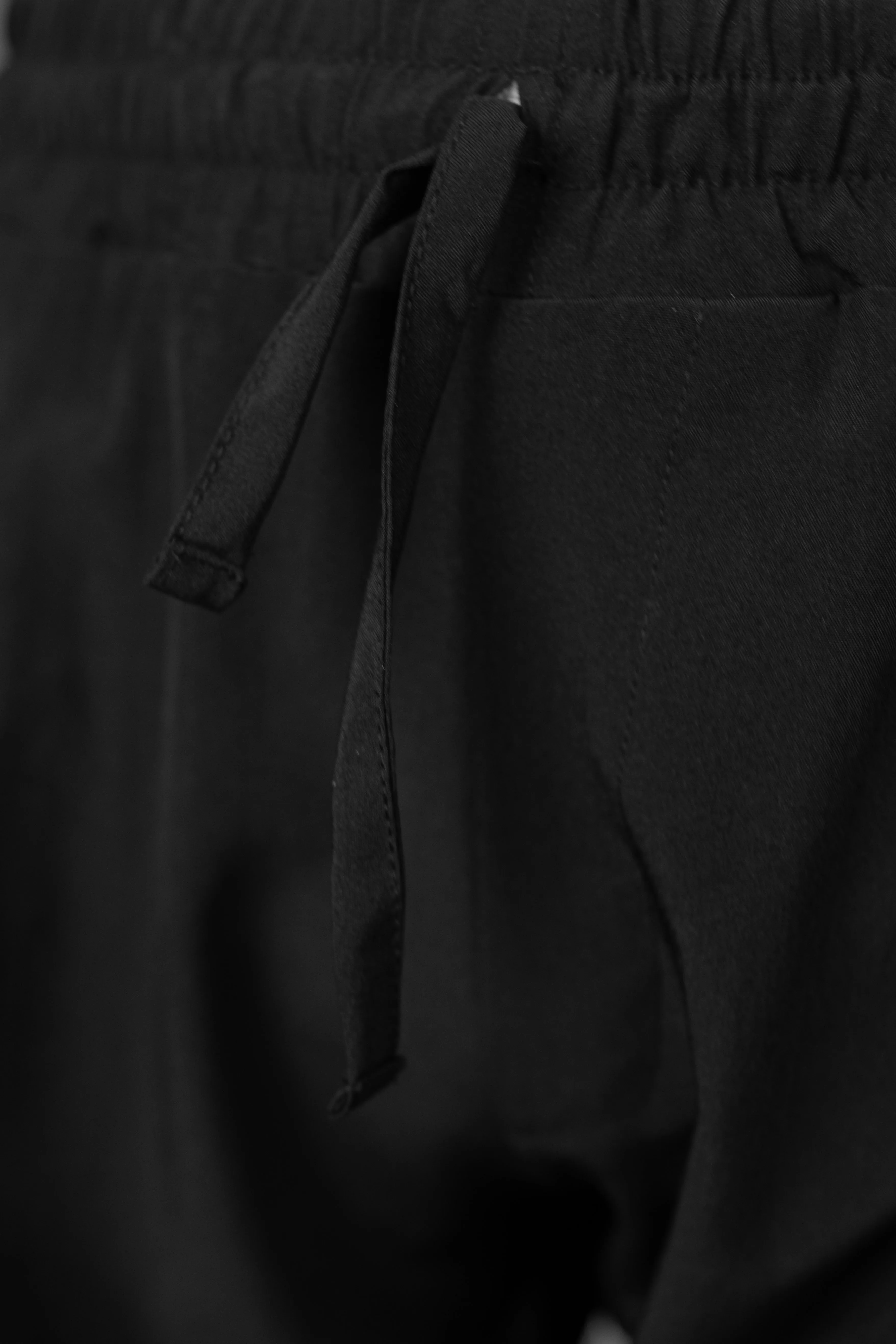 IVAR® Black Lycra Pleated Stapered Pants