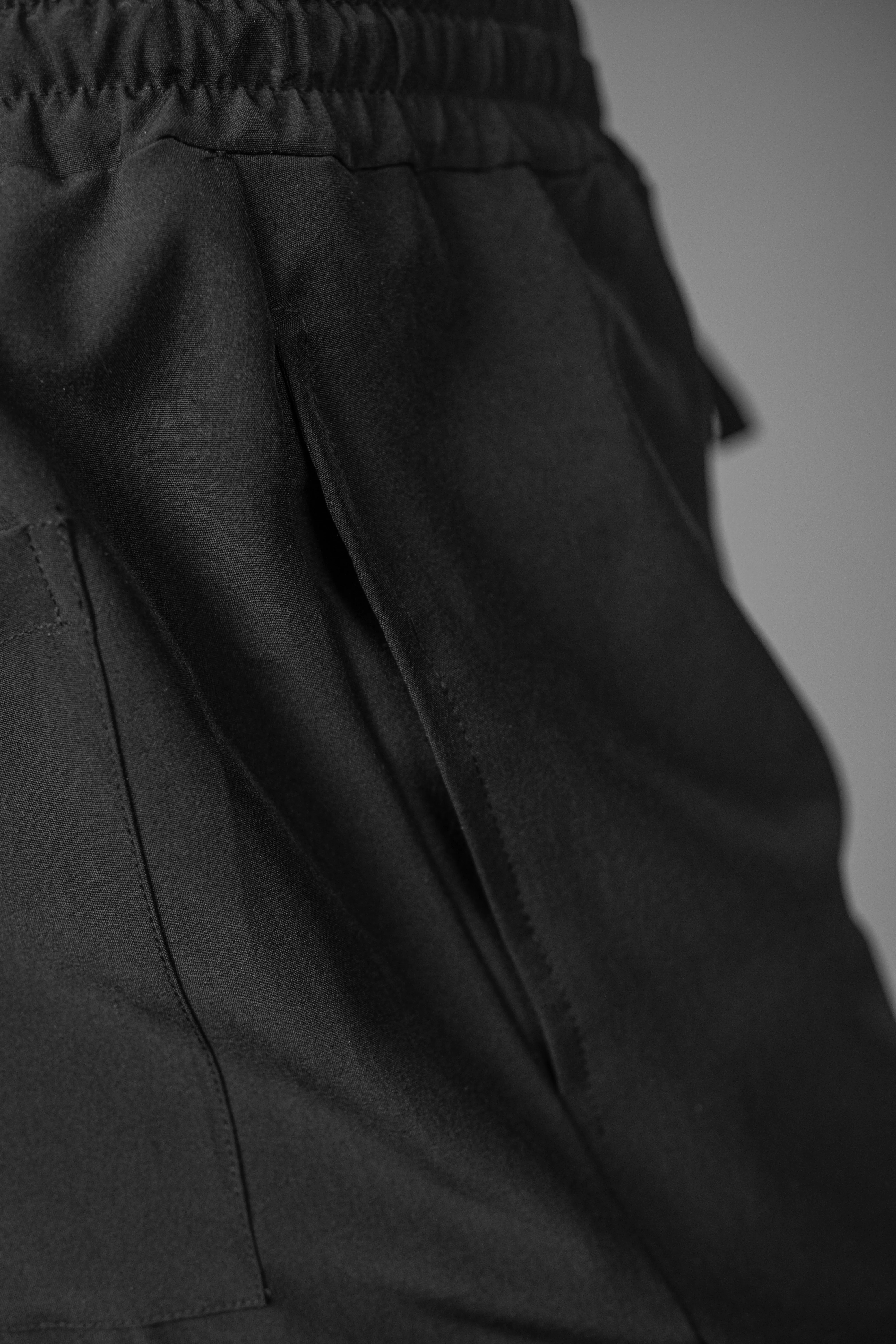 IVAR® Black Lycra Pleated Stapered Pants